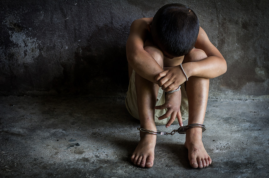 Child Was A Victim Of Human Trafficking, Foot Tied Up With Shackle In Emotional Stress, The Concept Of Stopping Violence Against Children